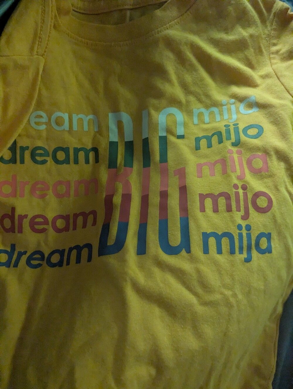 Yellow Long Sleeve Graphic Tee with Multicolor Text